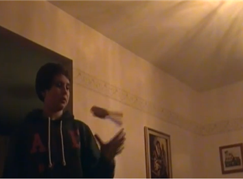 Most One-Handed Hairbrush Flips In 30 Seconds