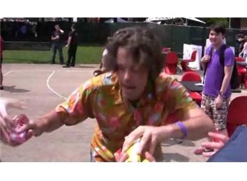 Most Ice Cream Sandwiches Given Away While Jumping No Handed On A Pogo Stick
