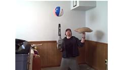 Longest Time To Hover A Ball With A Leaf Blower While Kneeling and Spinning A Pillow On One Finger