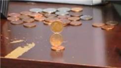 Tallest Penny Tower Stacked Vertically On Top Of A Penny
