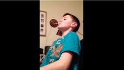 Most Pennies Stacked On A Popsicle Stick Held In Mouth