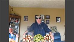 Longest Time To Balance A "Produce Display" On Top Of A Pole On Chin