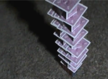 Tallest Single Deck Stack Of Cards Balanced On A Rubik\'s Cube 