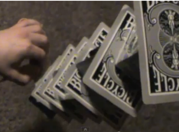Tallest Stack Of Cards Balanced On A Pair Of Scissors