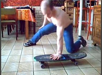 Most Consecutive One-Armed Double-Clap Push-Ups On A Skateboard
