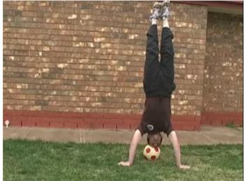 Longest Headstand On A Soccer Ball