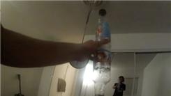 Fastest Time To Spin 360 Degrees Five Times While Balancing Two SoBe Bottles On One Finger