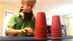 Fastest 6-6 Speed Stacking While Wearing Two Pairs Of Headphones Around Neck