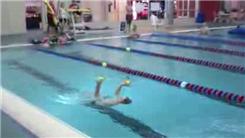 Most Catches Juggling Four Balls While Swimming