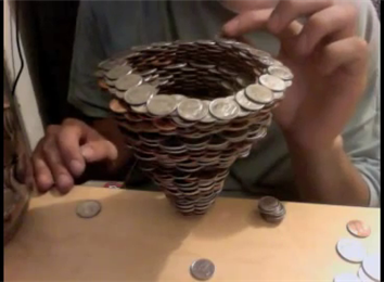 Most Coins Balanced On A Dime