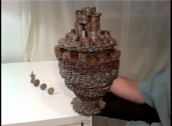 Most Coins Balanced On A Penny