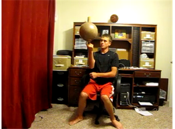 Longest Time Spinning Basketball On Finger In An Office