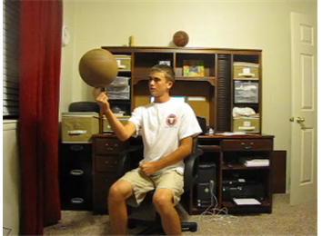 Longest Time Spinning Basketball On Finger In An Office