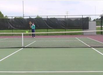 Most Tennis Serves Using A Wooden Racket With Press Still Attached