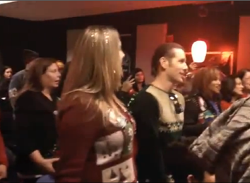 Largest Group To Wear Ugly Sweaters  While Singing 