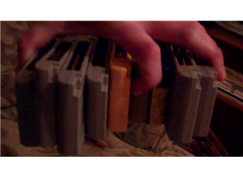 Most Nintendo 64 Cartridges Held Upside Down In One Hand At Once
