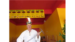 Longest Time To Balance 12-Inch Pizza On A Pole On Chin While Kneeling