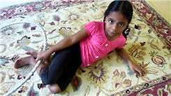 Most Hula Hoop Rotations Around Foot While Lying Down