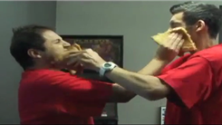 Most Tandem Pizza Slice Face Slaps In 15 Seconds