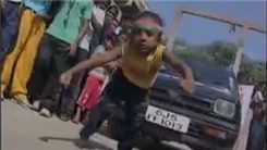 Longest Distance For A Four-Year-Old To Pull A Car Using Hair