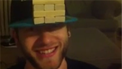 Most Jenga Blocks Balanced On Brim Of Hat