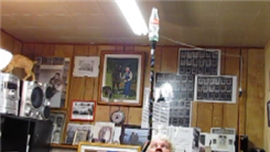 Longest Time Balancing Coca-Cola Bottle On Top Of A Walking Cane On Thumb While Seated