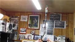 Longest Time To Balance A Coca-Cola Bottle On Top Of A Walking Cane On Head While Seated