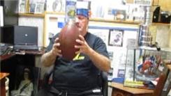 Longest Time To Balance A Wine Bottle On Top Of A Football On The Back Of The Hand