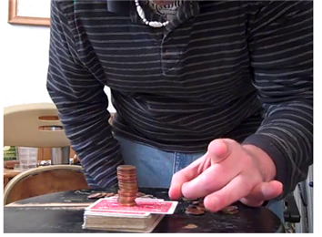 Tallest Penny Tower On A Deck Of 52 Playing Cards While Dealing The Top Card Out
