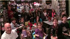 Most People Simultaneously Reading Aloud In A Bookstore