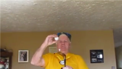 Longest Time To Balance A Golf Ball On Top Of A Golf Club On Chin While Balancing Three Hockey Pucks On Forehead