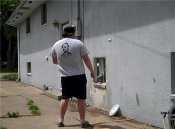 Most Times To Toss A Baseball Behind Back And Bounce Off Of The Side Of A Building In 30 Seconds