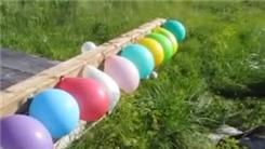 Most Balloons Hit With One Shot From 50 Yards While Kneeling 