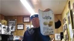 Longest Time To Balance A 10-Pound Bag Of Potatoes On Top Of A Pole On Chin