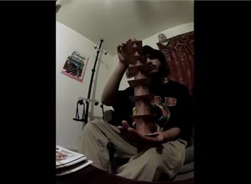 Most Cards Stacked In One Hand