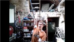 Most Catches While Juggling Two Balls In One Hand And Hanging From The Other