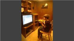 Longest Time For A 9-Year-Old To Throw A Ball Between Hands While Watching Television