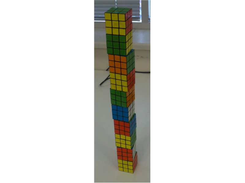 Tallest Tower Of Solved Rubik\'s Cubes