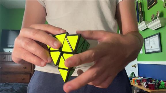 Fastest Time To Solve A Pyraminx While Hopping On One Leg
