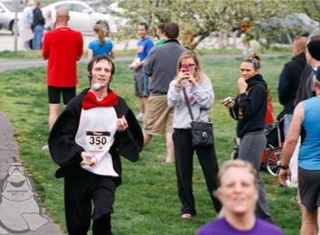 Fastest 5K Run While Juggling Three Balls And Dressed Like A Penguin