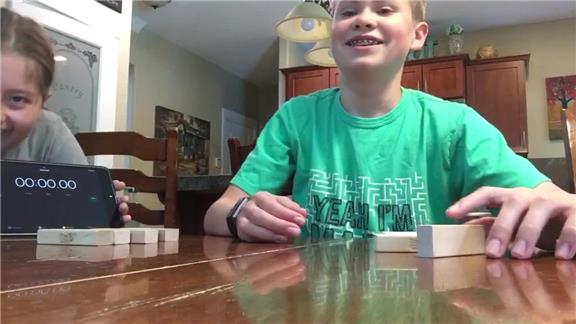 Fastest Time to Stand Up 10 Jenga blocks 