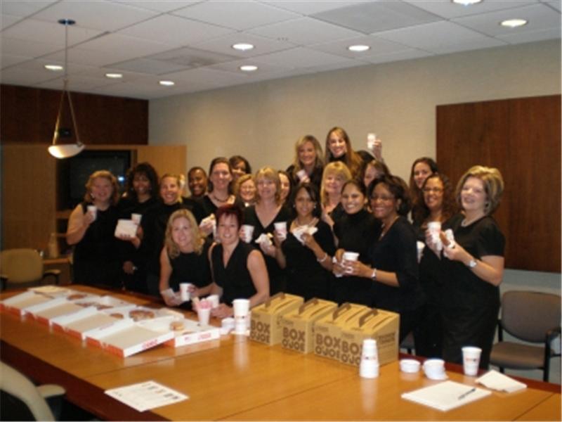 Most Women Eating Doughnuts And Drinking Coffee While Dressed In Black