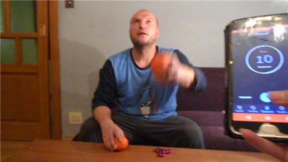 Most Throws a Rotating Fidget Spinner From One Hand to the Other in 10 Seconds and 2 Mandarins on the Forehead.