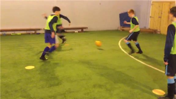 4 Children Passing a Soccer Ball 102 Times in 1 Minute