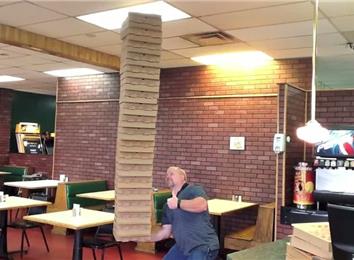 Most Pizza Boxes Held In Hand At Once | World Record | Clint Poore
