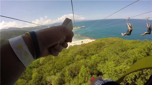 Ripping a Deck of Cards in Half on the Dragon\'s Breath Zip in Labadee,Haiti.First Person to Do It.