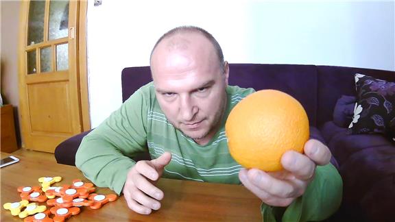 Most Fidget Spinners Spun On Oranges