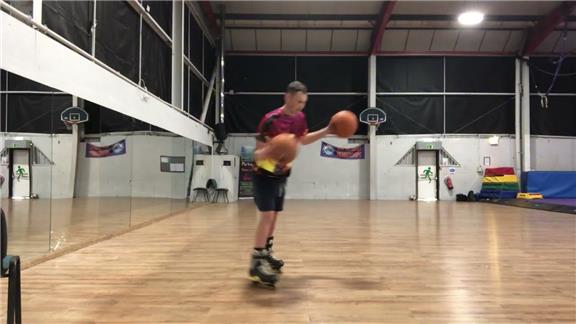 Longest Time to Dribble Two Basketballs at Once While Rollerblading