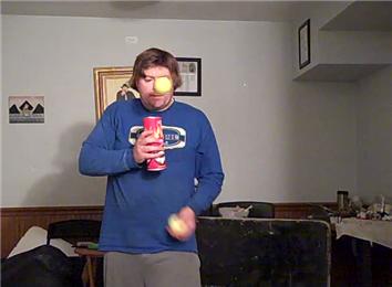 Most Consecutive Passes Of Two Tennis Balls Through A Hollow Pringles
