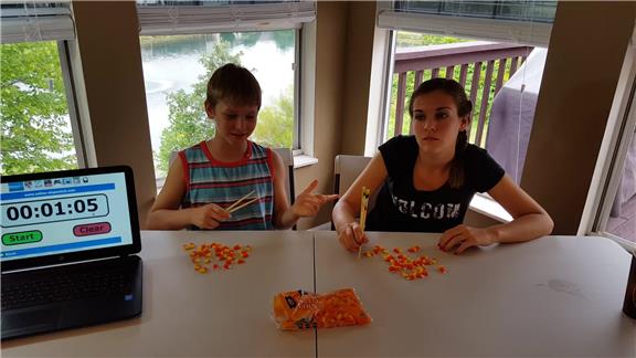 Most Candy Corn Eaten in 1 Minute by a Pair Using Chopsticks